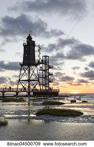 Lighthouse Obereversand, evening mood, Dorum-Neufeld, Lower Saxony, Germany, Europe View Large Photo Image Stock Photo - Lighthouse Obereversand, evening mood, Dorum-Neufeld, Lower Saxony, Germany, Europe. Fotosearch