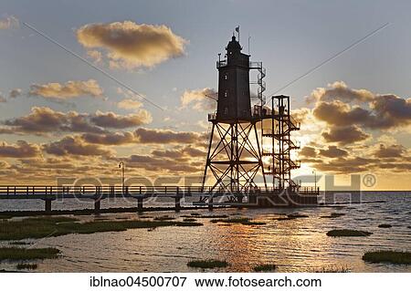 Lighthouse Obereversand, Sunset, Dorum-Neufeld, Lower Saxony, Germany, Europe View Large Photo Image Stock Photo - Lighthouse Obereversand, Sunset, Dorum-Neufeld, Lower Saxony, Germany, Europe. Fotosearch