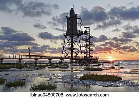 Lighthouse Obereversand, Sunset, Dorum-Neufeld, Lower Saxony, Germany, Europe View Large Photo Image Stock Photo - Lighthouse Obereversand, Sunset, Dorum-Neufeld, Lower Saxony, Germany, Europe. Fotosearch