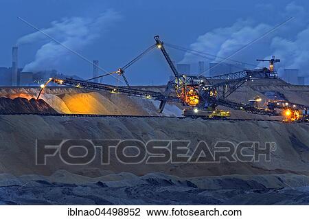 Lignite opencast mine at night, stacker, Garzweiler, North Rhine-Westphalia, Germany, Europe View Large Photo Image Stock Image - Lignite opencast mine at night, stacker, Garzweiler, North Rhine-Westphalia, Germany, Europe. Fotosearch