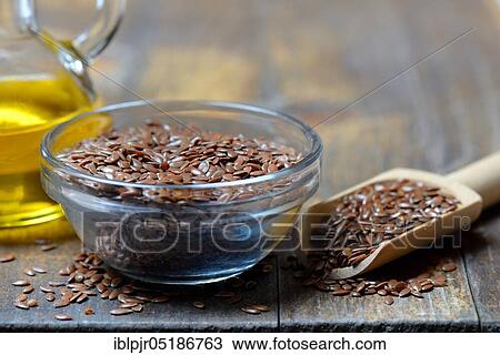 Linseed ( Linum usitatissimum) in husk and shovel and linseed oil View Large Photo Image Stock Image - Linseed ( Linum usitatissimum) in husk and shovel and linseed oil. Fotosearch