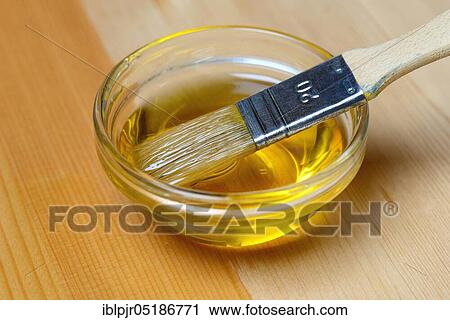 Linseed oil ( Linum usitatissimum) in bowl and brush, painting wood with linseed oil View Large Photo Image Stock Image - Linseed oil ( Linum usitatissimum) in bowl and brush, painting wood with linseed oil. Fotosearch