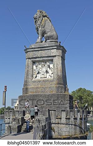 Lion statue in the harbor of Lindau, Lake Constance, Bavaria, Germany, Europe View Large Photo Image Stock Photo - Lion statue in the harbor of Lindau, Lake Constance, Bavaria, Germany, Europe. Fotosearch
