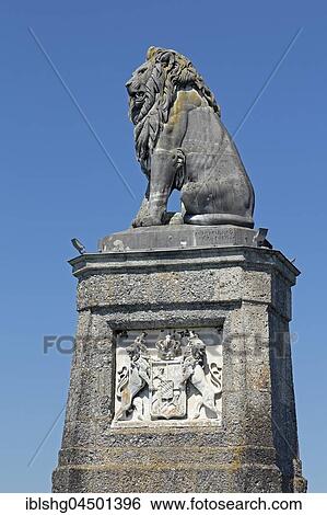 Lion statue in the harbor of Lindau, Lake Constance, Bavaria, Germany, Europe View Large Photo Image Stock Photograph - Lion statue in the harbor of Lindau, Lake Constance, Bavaria, Germany, Europe. Fotosearch