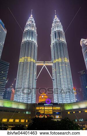 Lit Petronas Towers at night, Kuala Lumpur, Malaysia, Asia View Large Photo Image Stock Image - Lit Petronas Towers at night, Kuala Lumpur, Malaysia, Asia. Fotosearch