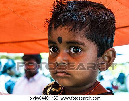 Stock Photo - Little boy with big eyes, Chinnamanur, Tamil Nadu, India, Asia. Fotosearch
