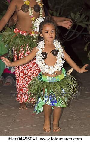 Stock Image - Little girl decorated with flowers, Polynesian dancer, Raiatea, French Polynesia, South Pacific, Oceania. Fotosearch