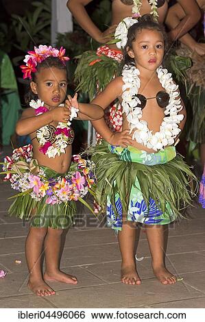 Stock Photograph - Little girls decorated with flowers, Polynesian dancer, Raiatea, French Polynesia, South Pacific, Oceania. Fotosearch