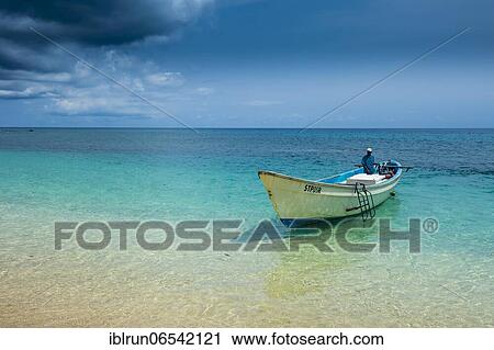Little motorboat in the turquoise waters of Banana beach, Unesco biosphere reserve, Principe, Sao Tome and Principe, Atlantic Ocean, Africa View Large Photo Image Stock Image - Little motorboat in the turquoise waters of Banana beach, Unesco biosphere reserve, Principe, Sao Tome and Principe, Atlantic Ocean, Africa. Fotosearch