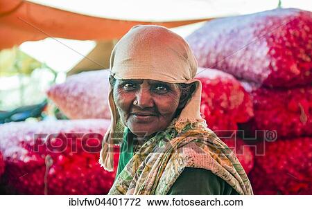 Stock Image - Local woman at a market, Chinnamanur, Tamil Nadu, India, Asia. Fotosearch