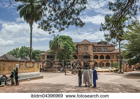 Locals outside Sultan Palace, Foumban, West Region, Cameroon, Africa,, Africa View Large Photo Image Stock Photo - Locals outside Sultan Palace, Foumban, West Region, Cameroon, Africa,, Africa. Fotosearch