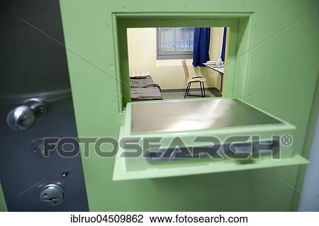 Stock Image - Looking through hatch in jail cell, prison, Düsseldorf prison, North Rhine-Westphalia, Germany, Europe. Fotosearch