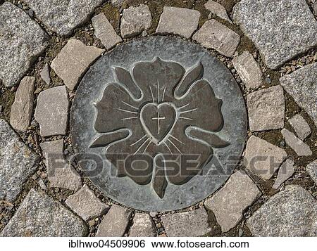 Luther Rose, bronze relief in plaster, signpost to Luther sites, Eisleben, Saxony-Anhalt, Germany, Europe View Large Photo Image Stock Photograph - Luther Rose, bronze relief in plaster, signpost to Luther sites, Eisleben, Saxony-Anhalt, Germany, Europe. Fotosearch