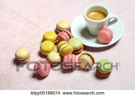 Picture - Luxemburgerli confectionery and cup of coffee, espresso, macarons, speciality of Confiserie Sprüngli. Fotosearch