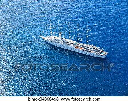 Stock Photo - Luxury sailing ship Club Med 2 in front of English Harbour, West Indies, Caribbean, Antigua and Barbuda, Central America. Fotosearch
