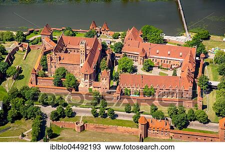 Malbork Castle, castle in brick Gothic, German Order, Nogat River, Malbork, Pomerania Province, Poland, Europe View Large Photo Image Stock Image - Malbork Castle, castle in brick Gothic, German Order, Nogat River, Malbork, Pomerania Province, Poland, Europe. Fotosearch