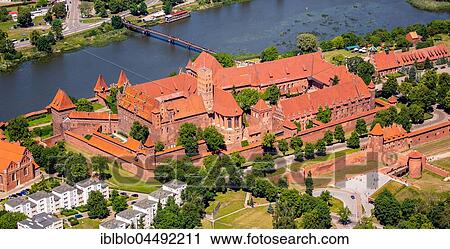 Malbork Castle, castle in brick Gothic, German Order, Nogat River, Malbork, Pomerania Province, Poland, Europe View Large Photo Image Stock Image - Malbork Castle, castle in brick Gothic, German Order, Nogat River, Malbork, Pomerania Province, Poland, Europe. Fotosearch