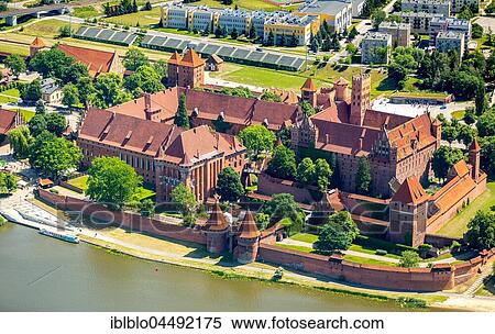 Malbork Castle, castle in brick Gothic, German Order, Nogat River, Malbork, Pomerania Province, Poland, Europe View Large Photo Image Stock Photography - Malbork Castle, castle in brick Gothic, German Order, Nogat River, Malbork, Pomerania Province, Poland, Europe. Fotosearch