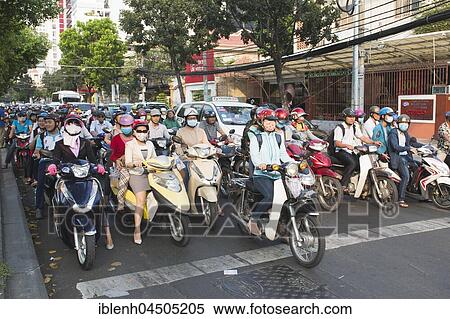 Stock Photography - Many mopeds on the road, Ho Chi Minh City, Vietnam, Asia. Fotosearch