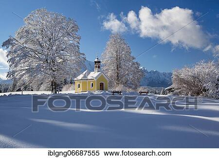 Stock Photography - Maria Rast Chapel on the Humpback Meadows with Wetterstein Mountains, Krün, Werdenfelser Land, Upper Bavaria, Bavaria, Germany, Europe. Fotosearch
