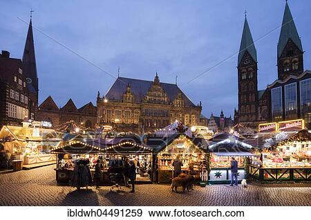 Stock Photo - Marketplace with Christmas Market, City Hall and Cathedral, Twilight, Bremen, Germany, Europe. Fotosearch