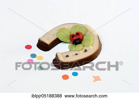 Marzipan horseshoe, lucky beetle View Large Photo Image Stock Photo - Marzipan horseshoe, lucky beetle. Fotosearch