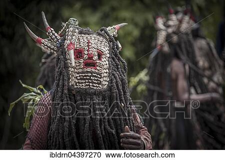 Men of the ethnic group of the Bamileke with traditional masks, Dance of Death in honor of a deceased person, Badenkop, West Region, Cameroon, Africa View Large Photo Image Stock Image - Men of the ethnic group of the Bamileke with traditional masks, Dance of Death in honor of a deceased person, Badenkop, West Region, Cameroon, Africa. Fotosearch