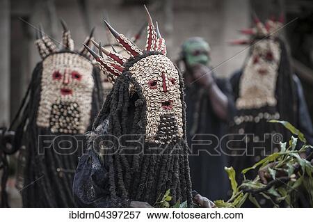 Men of the ethnic group of the Bamileke with traditional masks, Dance of Death in honor of a deceased person, Badenkop, West Region, Cameroon, Africa View Large Photo Image Stock Photo - Men of the ethnic group of the Bamileke with traditional masks, Dance of Death in honor of a deceased person, Badenkop, West Region, Cameroon, Africa. Fotosearch