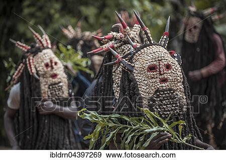 Men of the ethnic group of the Bamileke with traditional masks, Dance of Death in honor of a deceased person, Badenkop, West Region, Cameroon, Africa View Large Photo Image Stock Photo - Men of the ethnic group of the Bamileke with traditional masks, Dance of Death in honor of a deceased person, Badenkop, West Region, Cameroon, Africa. Fotosearch