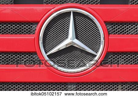 Stock Photo - Mercedes Benz logo, Mercedes star on a red radiator grill of a truck, Germany, Europe. Fotosearch