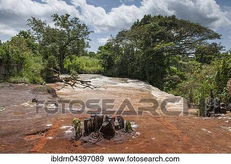 Stock Photo - Metche waterfall, animist sacrificial site in the foreground, Bafoussam, West Region, Cameroon, Africa. Fotosearch