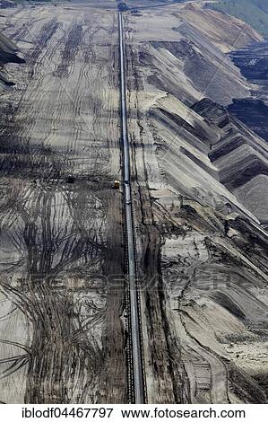 Mile-long conveyor belts, brown coal surface mine Garzweiler, North Rhine-Westphalia, Germany, Europe View Large Photo Image Stock Photo - Mile-long conveyor belts, brown coal surface mine Garzweiler, North Rhine-Westphalia, Germany, Europe. Fotosearch