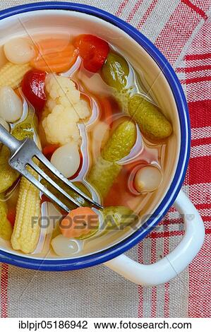 Mixed pickles with carrots, cauliflower, gherkins, onions and corn onions in a bowl with fork, pickled, pickled, pickled gherkin View Large Photo Image Stock Image - Mixed pickles with carrots, cauliflower, gherkins, onions and corn onions in a bowl with fork, pickled, pickled, pickled gherkin. Fotosearch