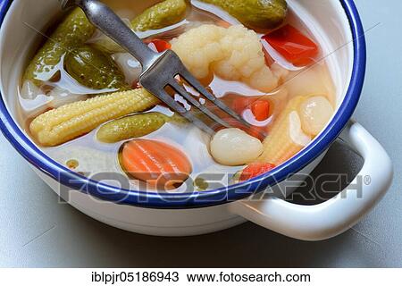 Mixed pickles with carrots, cauliflower, gherkins, onions and corn onions in a bowl with fork, pickled, pickled, pickled gherkin View Large Photo Image Stock Image - Mixed pickles with carrots, cauliflower, gherkins, onions and corn onions in a bowl with fork, pickled, pickled, pickled gherkin. Fotosearch