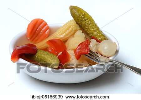 Mixed pickles with carrots, cauliflower, cucumber, onions and corn on the cob in a bowl with fork, pickled, pickled View Large Photo Image Stock Photo - Mixed pickles with carrots, cauliflower, cucumber, onions and corn on the cob in a bowl with fork, pickled, pickled. Fotosearch