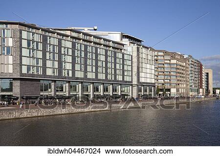 Modern architecture, Hilton Hotel Double Tree and library on Oosterdok, Amsterdam, Holland, The Netherlands, Europe View Large Photo Image Picture - Modern architecture, Hilton Hotel Double Tree and library on Oosterdok, Amsterdam, Holland, The Netherlands, Europe. Fotosearch