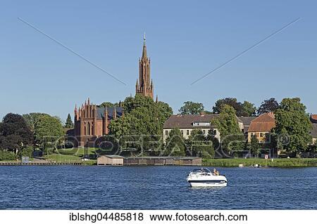 Monastery Church and lake, Malchow, Mecklenburg Lake District, Mecklenburg-Western Pomerania, Germany, Europe View Large Photo Image Stock Photo - Monastery Church and lake, Malchow, Mecklenburg Lake District, Mecklenburg-Western Pomerania, Germany, Europe. Fotosearch