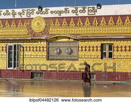 Stock Photograph - Monk inside temple complex at Golden Rock Kyaiktiyo, Kyaikto, Myanmar, Asia. Fotosearch