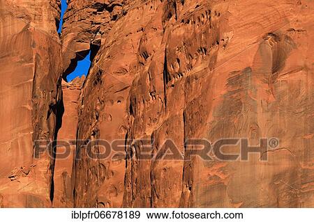 Stock Photo - Monument Valley, detail view of a sandstone monolith, arch, window of stone, Utah, USA, North America. Fotosearch