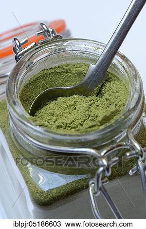 Moringa powder in glass ( Moringa oleifera) View Large Photo Image Stock Image - Moringa powder in glass ( Moringa oleifera). Fotosearch