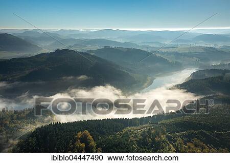 Morning fog over Lake Henne, Meschede, Sauerland, North Rhine-Westphalia, Germany, Europe View Large Photo Image Stock Image - Morning fog over Lake Henne, Meschede, Sauerland, North Rhine-Westphalia, Germany, Europe. Fotosearch