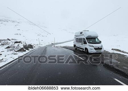 Motorhome, camper, in the snow during snowfall, Hardanger Vidda plateau, Norway, Europe View Large Photo Image Stock Image - Motorhome, camper, in the snow during snowfall, Hardanger Vidda plateau, Norway, Europe. Fotosearch