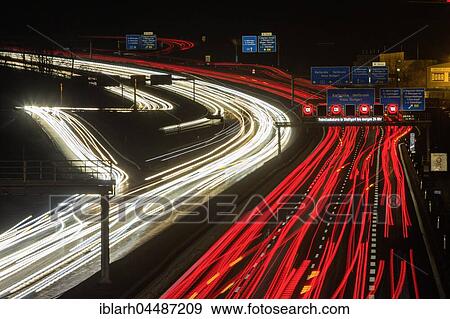 Motorway with light trails, fine dust alarm in Stuttgart, traffic bridge on the A8, Baden-Württemberg, Germany, Europe View Large Photo Image Stock Photo - Motorway with light trails, fine dust alarm in Stuttgart, traffic bridge on the A8, Baden-Württemberg, Germany, Europe. Fotosearch