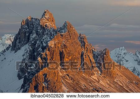 Mountain group Cadini di Misurina in the evening light, Dolomites, Province of South Tyrol, Italy, Europe View Large Photo Image Stock Photo - Mountain group Cadini di Misurina in the evening light, Dolomites, Province of South Tyrol, Italy, Europe. Fotosearch