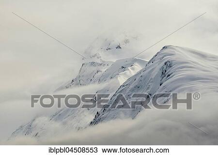 Mountains with snow and clouds, Chugach Mountains, Prince William Sound, Alaska View Large Photo Image Stock Image - Mountains with snow and clouds, Chugach Mountains, Prince William Sound, Alaska. Fotosearch