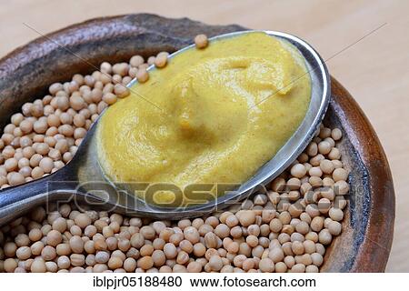 Stock Image - Mustard seeds and mustard. Fotosearch