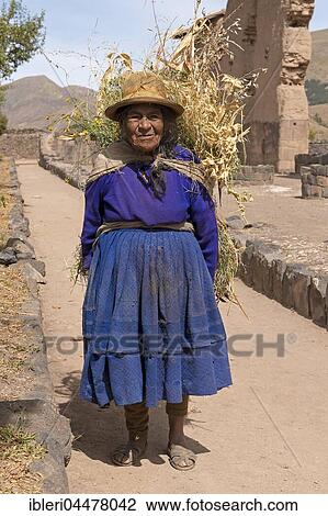 Native woman wearing load on her back, Queromarca, Cusco Province, Peru, South America View Large Photo Image Stock Image - Native woman wearing load on her back, Queromarca, Cusco Province, Peru, South America. Fotosearch