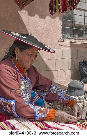 Stock Image - Native woman weaving, Queromarca, Cusco Province, Peru, South America. Fotosearch