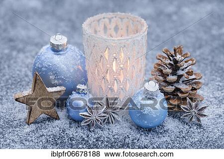Stock Photo - Natural Advent decoration in ice and snow. Fotosearch