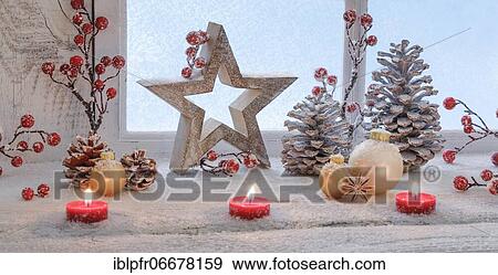 Stock Photo - Natural Advent decoration with candles. Fotosearch
